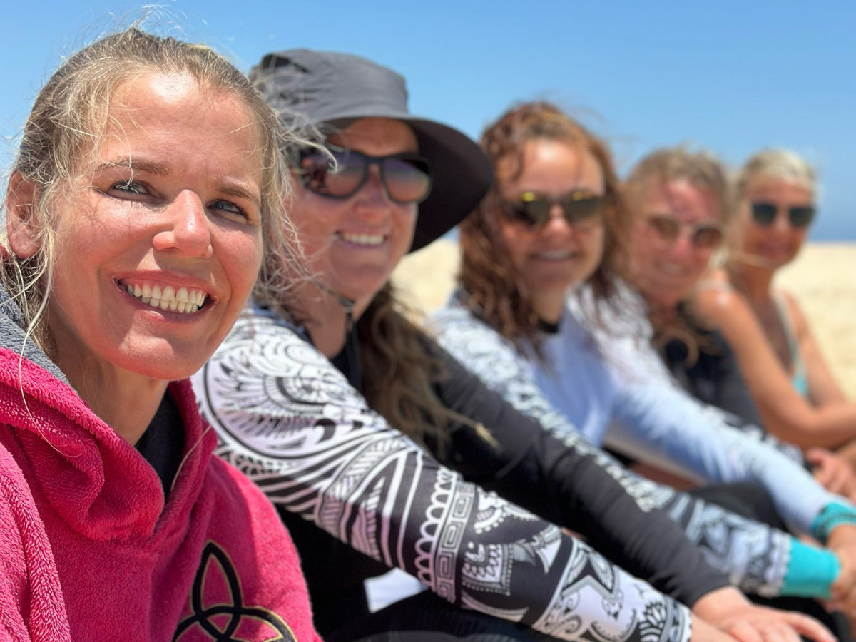 kitesurfing group on the beach