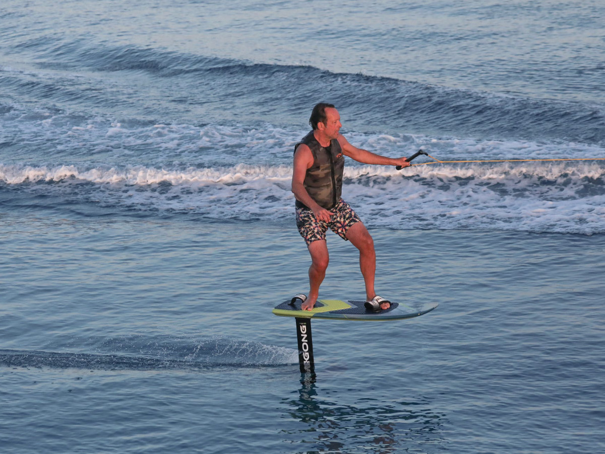 foilboarding behind a boat 